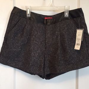 ELLE dressy shorts w/ faux leather waist band.